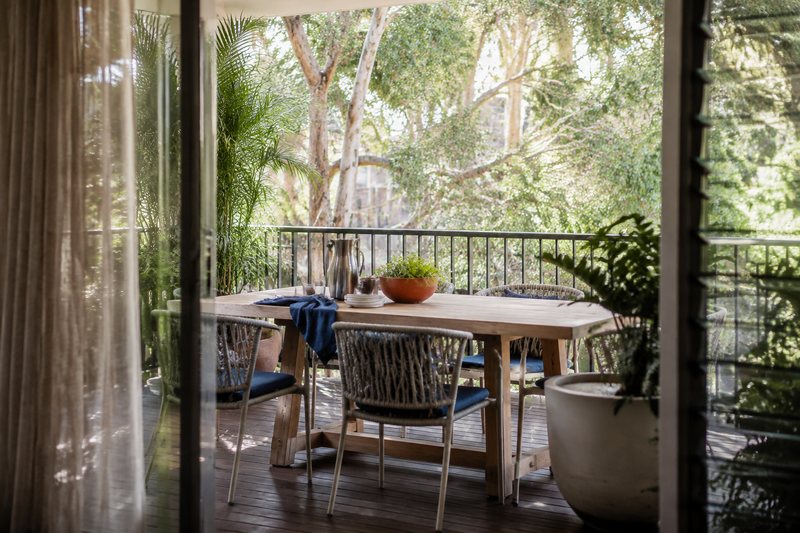 A Brisbane balcony asks for shade, airflow and weather-aware materials.